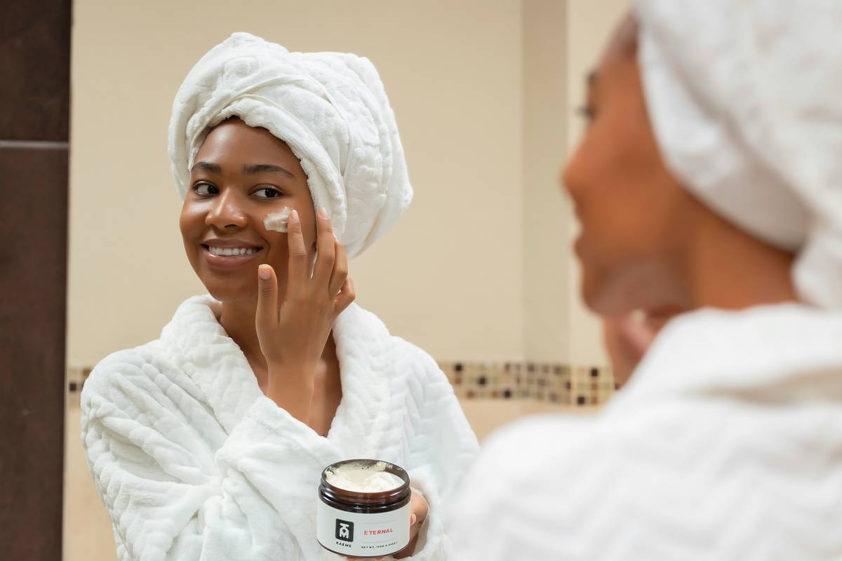 Woman applying organic aloe vera gel as part of her Organic Lifestyle skincare routine